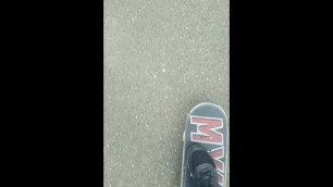 STROKING BIG SKATEBOARD WITH FEET