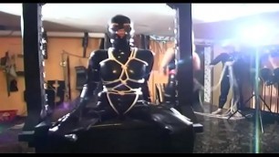 Latex girl tied up by her mistress